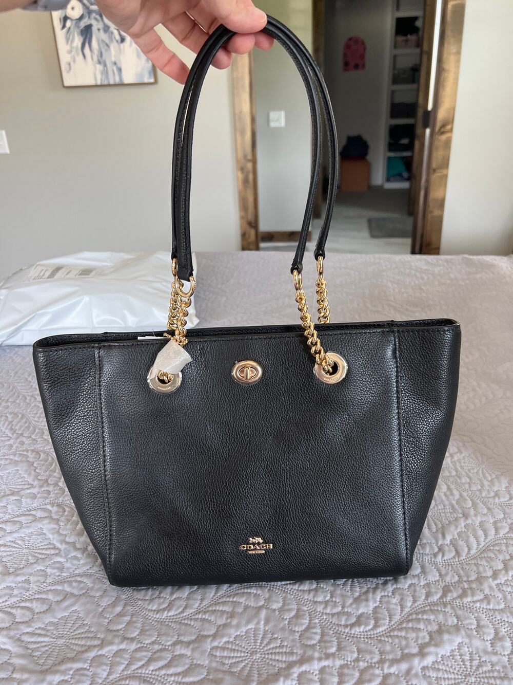 NWT Coach black pebbled shoulder purse with dust bag